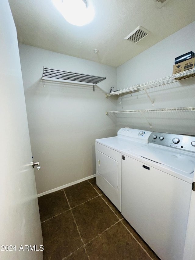 laundry room featuring washer and clothes dryer