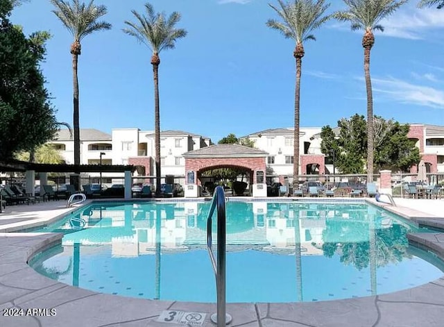 view of pool with a patio area and a gazebo