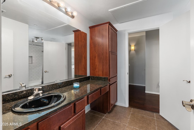 3302 N 7th St Unit 226, Phoenix, AZ 85014 - bathroom with vanity, tile patterned floors, and a shower