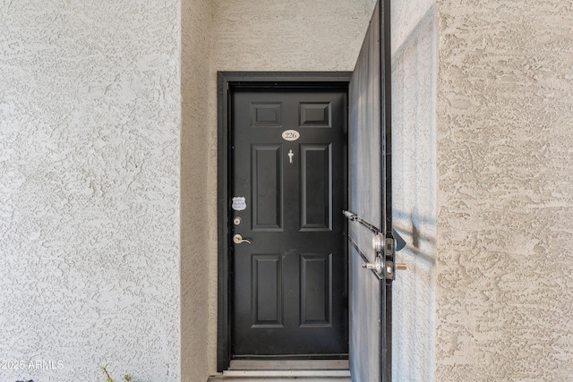3302 N 7th St Unit 226, Phoenix, AZ 85014 - view of exterior entry with stucco siding