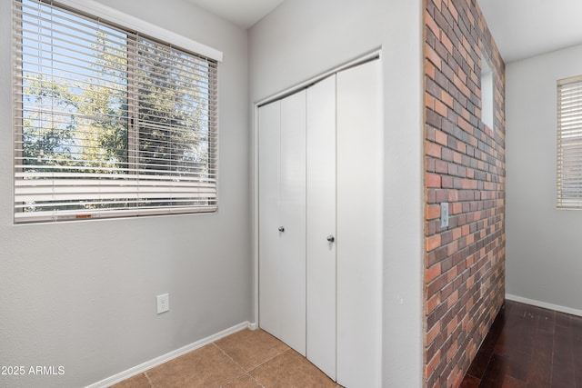 3302 N 7th St Unit 226, Phoenix, AZ 85014 - unfurnished bedroom featuring a closet and multiple windows