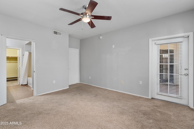 3302 N 7th St Unit 226, Phoenix, AZ 85014 - unfurnished bedroom featuring carpet flooring, access to outside, a ceiling fan, and ensuite bath