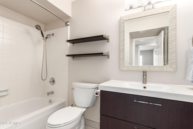 bathroom featuring shower / bathing tub combination, vanity, and toilet