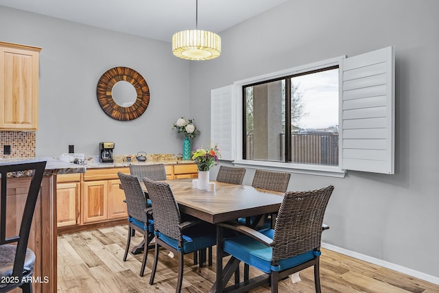 dining room featuring light hardwood / wood-style flooring