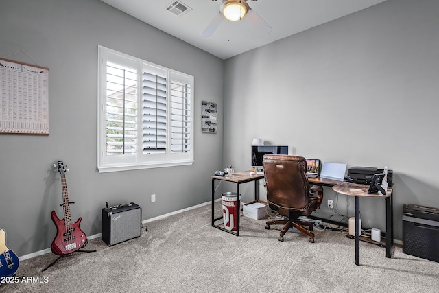 home office with carpet floors and ceiling fan