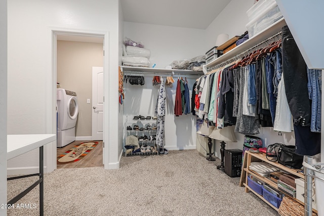 spacious closet with carpet