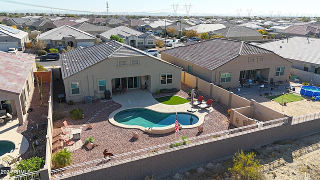 view of pool featuring cooling unit and a patio area