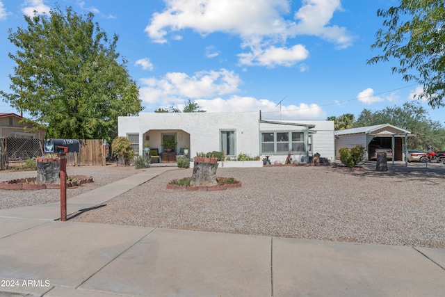 view of front facade featuring a carport