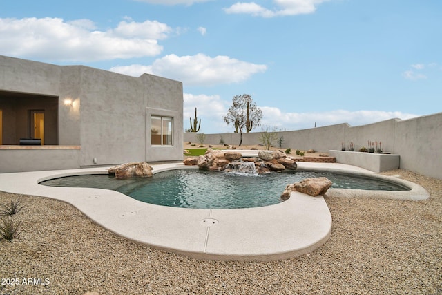 view of pool with a fenced backyard and a fenced in pool