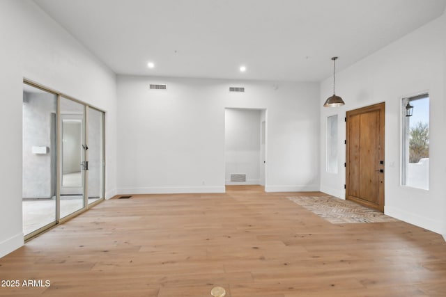 foyer featuring recessed lighting, visible vents, and light wood finished floors