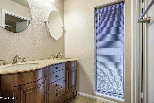 bathroom with vanity and tile patterned flooring