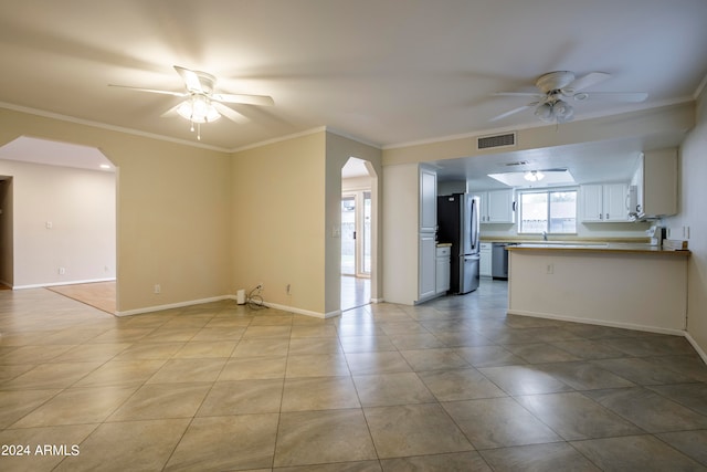 unfurnished living room with ornamental molding, light tile patterned floors, and ceiling fan