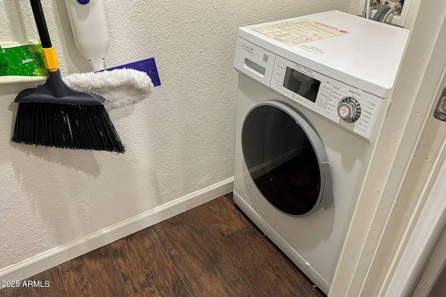 laundry room featuring washer / clothes dryer and dark wood-type flooring