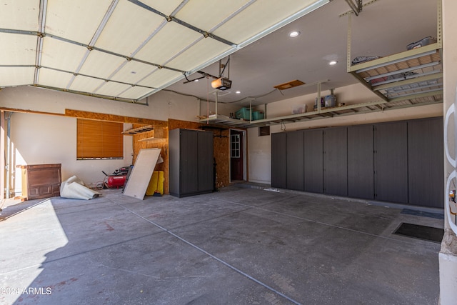 garage featuring a garage door opener