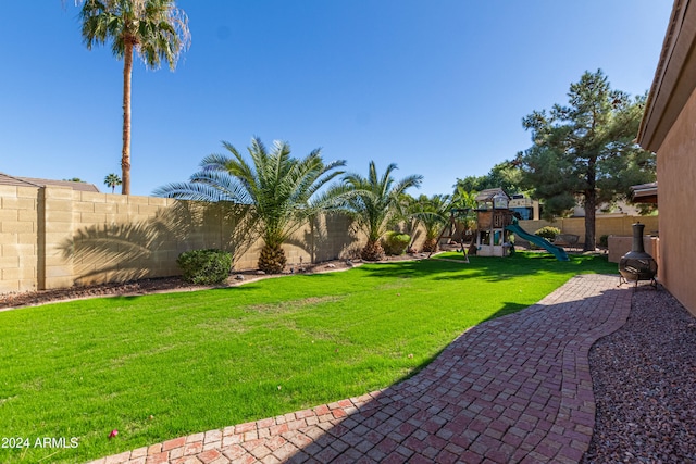 view of yard featuring a playground