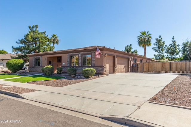 single story home featuring a garage