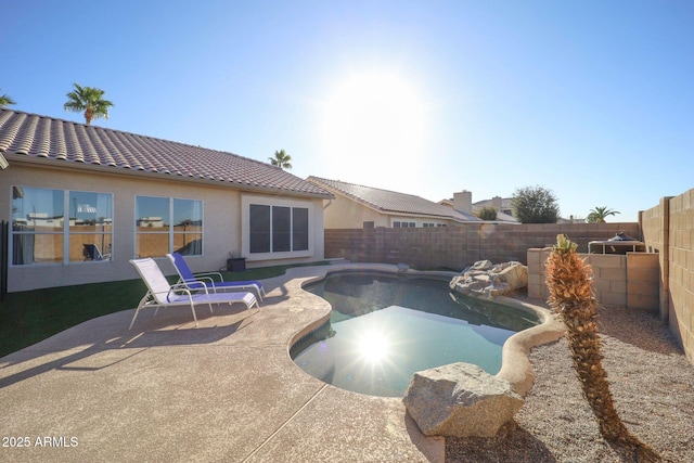 view of pool with a fenced backyard, a patio, and a fenced in pool