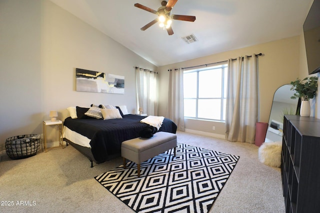 bedroom with vaulted ceiling, light carpet, baseboards, and visible vents