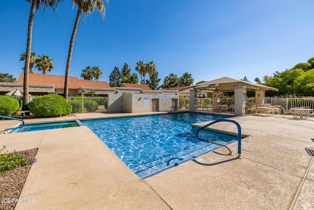 view of swimming pool featuring a patio