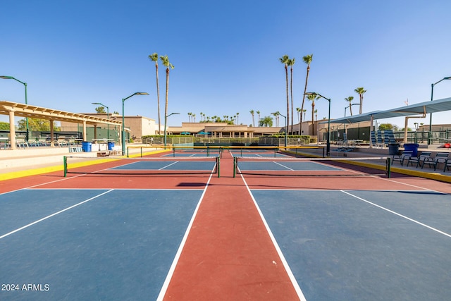 view of tennis court featuring basketball court