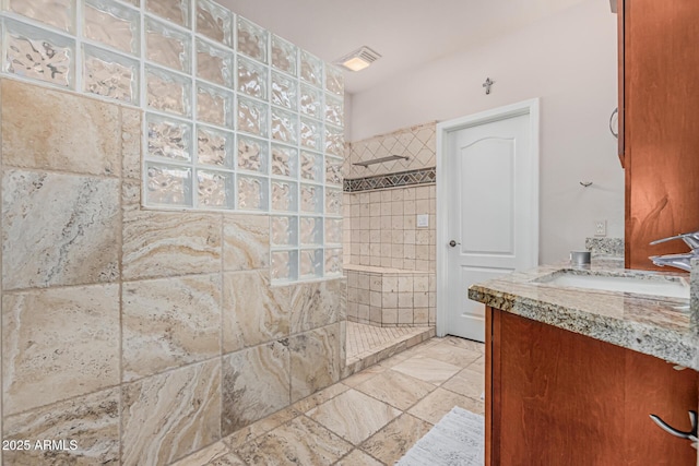 1635 W Windsong Dr, Phoenix, AZ 85045 - bathroom with visible vents, a walk in shower, and vanity
