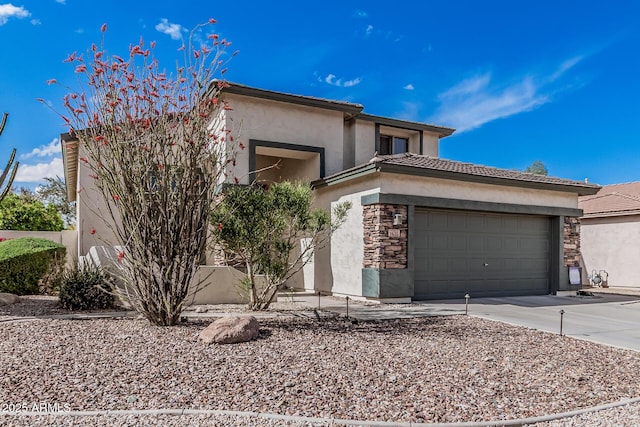 1635 W Windsong Dr, Phoenix, AZ 85045 - view of front facade featuring a tiled roof, stucco siding, stone siding, and driveway