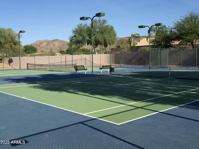 1635 W Windsong Dr, Phoenix, AZ 85045 - view of tennis court with fence and a mountain view