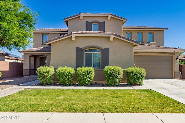 1217 W Fever Tree Ave, San Tan Valley, AZ 85140 - mediterranean / spanish-style home with a garage, driveway, stucco siding, and a tiled roof