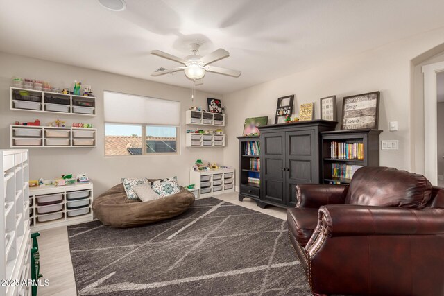 1217 W Fever Tree Ave, San Tan Valley, AZ 85140 - sitting room featuring ceiling fan and light wood-type flooring