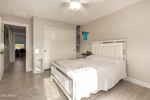 1217 W Fever Tree Ave, San Tan Valley, AZ 85140 - bedroom featuring a closet, light wood-style floors, baseboards, and a ceiling fan