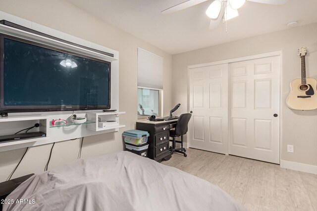 1217 W Fever Tree Ave, San Tan Valley, AZ 85140 - bedroom featuring wood finished floors, a closet, a ceiling fan, and baseboards