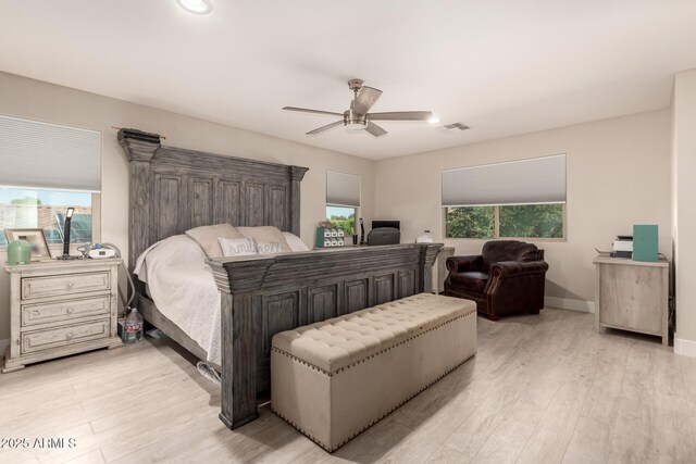 1217 W Fever Tree Ave, San Tan Valley, AZ 85140 - bedroom featuring multiple windows, light wood-type flooring, a ceiling fan, and recessed lighting