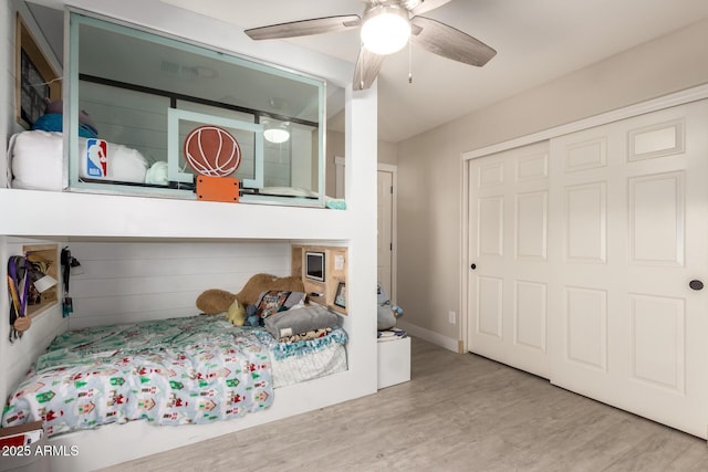 1217 W Fever Tree Ave, San Tan Valley, AZ 85140 - bedroom featuring wood finished floors, a closet, and a ceiling fan