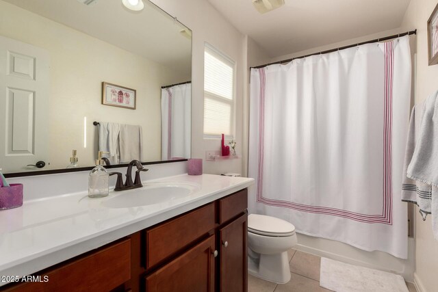 1217 W Fever Tree Ave, San Tan Valley, AZ 85140 - bathroom with tile patterned flooring, toilet, vanity, and shower / tub combo