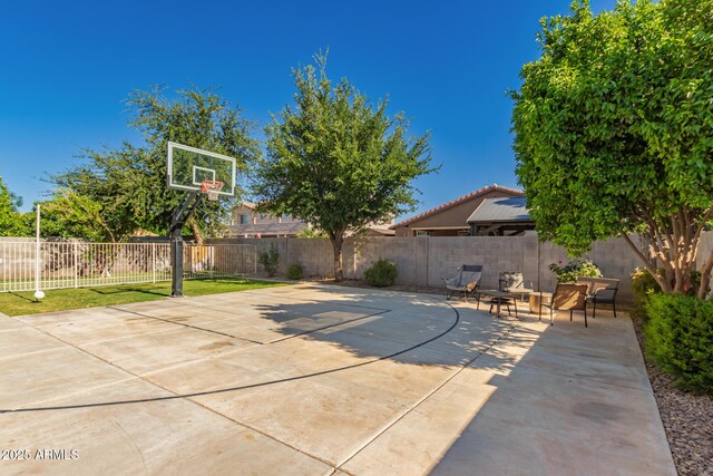 1217 W Fever Tree Ave, San Tan Valley, AZ 85140 - view of patio / terrace with basketball hoop and fence