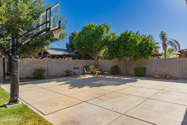 1217 W Fever Tree Ave, San Tan Valley, AZ 85140 - view of patio featuring basketball court and a fenced backyard