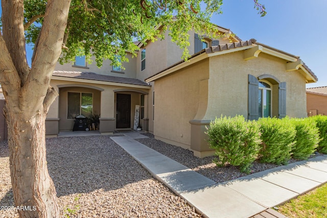 1217 W Fever Tree Ave, San Tan Valley, AZ 85140 - view of front of property with stucco siding and a tiled roof