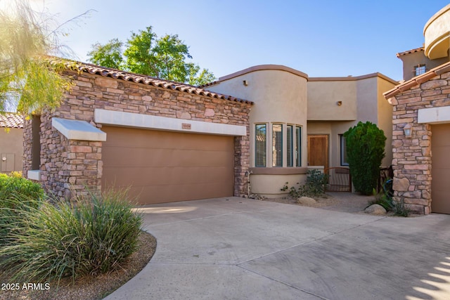 view of front of home with a garage