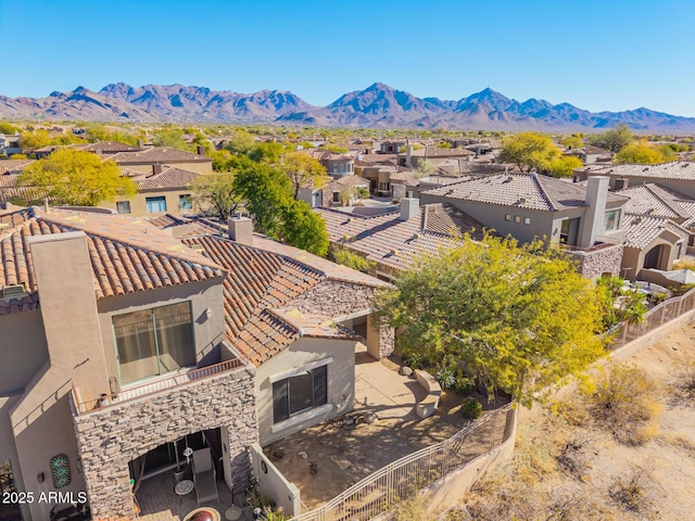 drone / aerial view featuring a mountain view