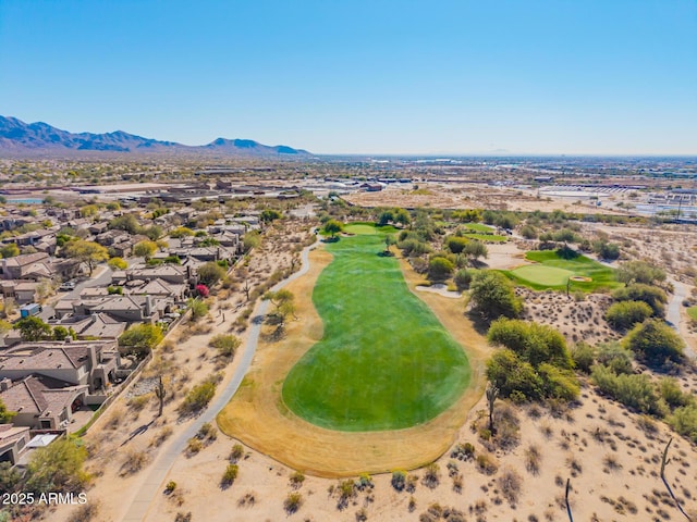 birds eye view of property featuring a mountain view