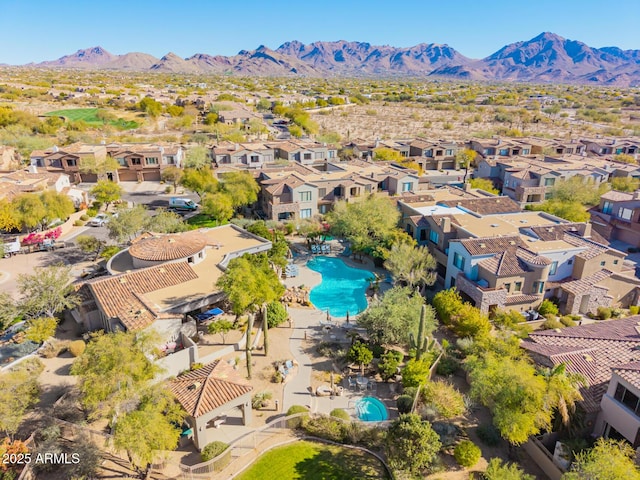 drone / aerial view featuring a mountain view