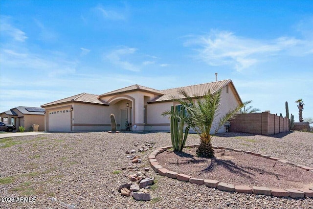 view of front of home featuring a garage