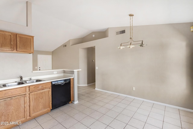 kitchen with dishwasher, lofted ceiling, sink, hanging light fixtures, and light tile patterned floors