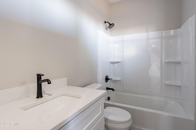 full bathroom with tub / shower combination, vanity, and toilet