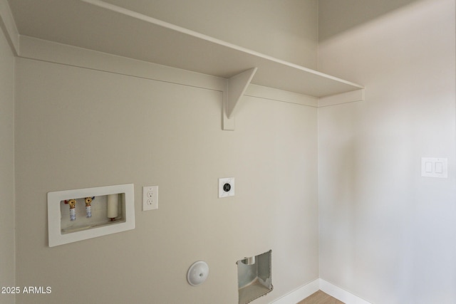 laundry room featuring hookup for an electric dryer, hookup for a gas dryer, laundry area, washer hookup, and baseboards