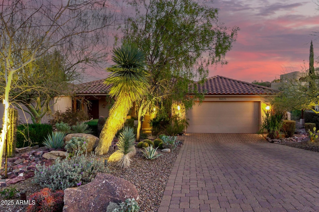 view of front of property featuring a garage