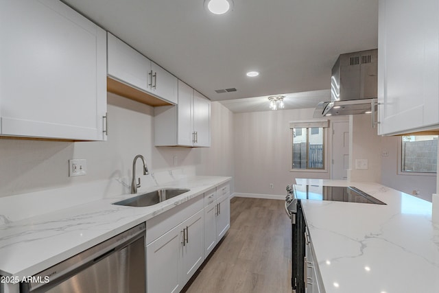 kitchen with range hood, dishwasher, sink, electric range, and light stone counters