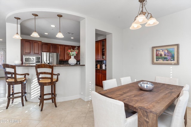 dining room featuring light tile patterned floors