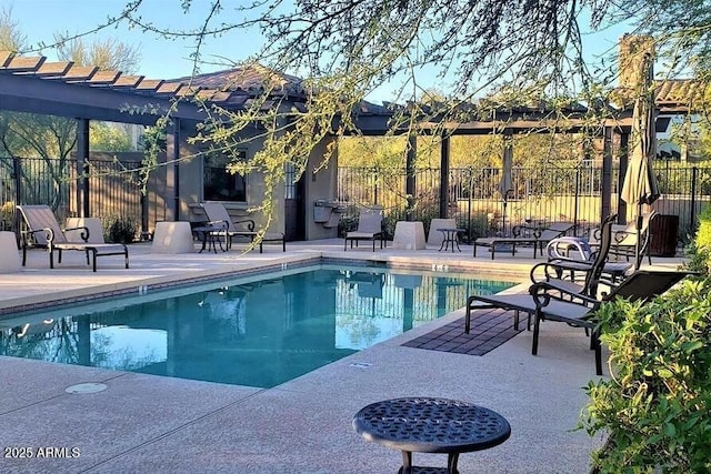 view of swimming pool featuring a pergola and a patio area