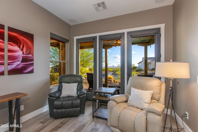 sitting room with light hardwood / wood-style floors